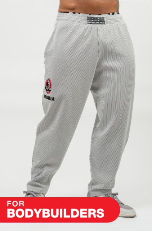 Voľné tepláky s vreckami SIGNATURE